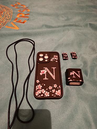 Məhsul: “N” hərfli çiçək naxışlı aksesuar dəsti Tərkib: - Telefon