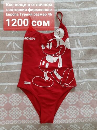 Другая женская одежда: Джинсовый комбинезон синего цвета с классическим дизайном. Модель — 28