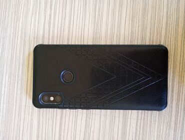 uzuz telefonlar: Xiaomi Redmi 4, 64 GB, rəng - Qara, 
 Düyməli, Barmaq izi, İki sim kartlı