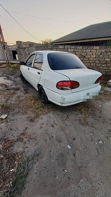 04 maşın: Kia Avella: 1.3 l | 1997 il Hetçbek — 2