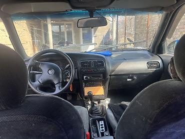 эшик машина: Nissan Primera: 1993 г., 1.6 л, Кол менен иштөөчү, Бензин, Седан — 6