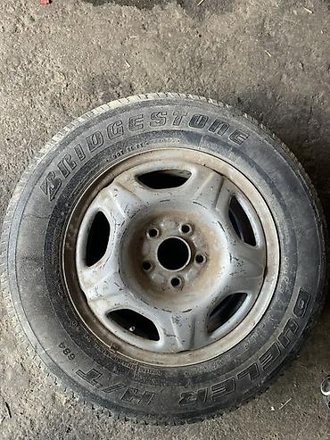 385 55: Колесо в сборе: шина Bridgestone Dueler H/T 684 и стальной диск — 1