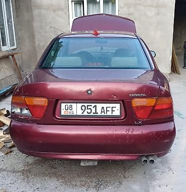 Транспорт: Mitsubishi Carisma: 1989 г., Автомат, Бензин, Седан — 2