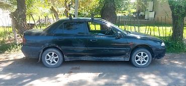 rox 01: Mitsubishi Carisma: 1998 г., Механика, Бензин, Седан — 3