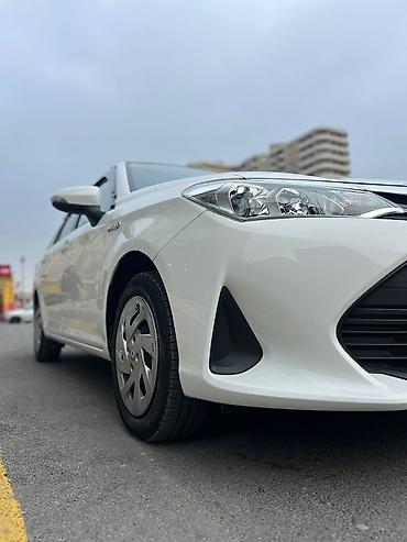 orta panel: Toyota Corolla: 1.5 l | 2019 il Sedan — 2