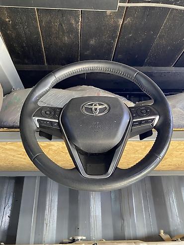 Рулевое колесо Toyota с мультирулем и подрулевыми лепестками