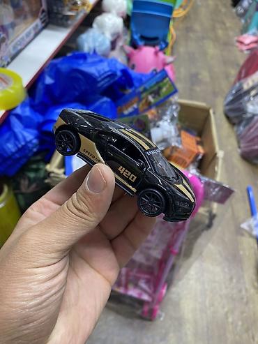 mini gt: Игрушечная машинка в виде спортивного автомобиля. Выполнена в черном — 1