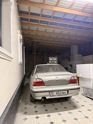 тонировка авто: Услуги тонировки автомобилей. На фото показан процесс выполнения — 5