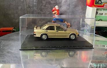 Avtomobil modelləri: Коллекционная модель Mercedes-Benz 190E 2.3 16V W201 gold 1984 EDICOLA — 16