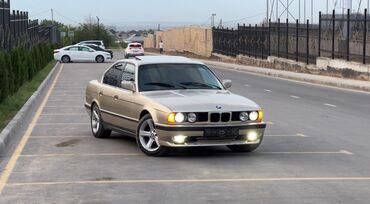 е34 e34 34: Автомобиль BMW 5-Series E34 520 брызги шампанский цвет. Обьем 2.5 Год