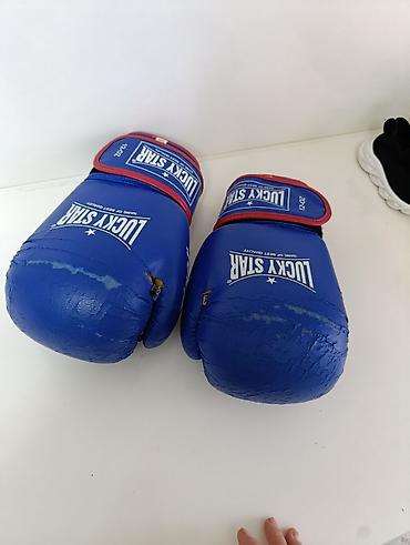 boks torbası: Məhsul: Lucky Star boks əlcəkləri - Çəki: 12 oz (hər əlcəkdə qeyd — 1