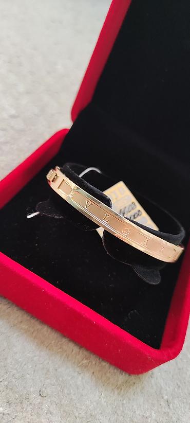 золот: Женский браслет-кафф в фирменном стиле BVLGARI. Золото 585 пробы — 1