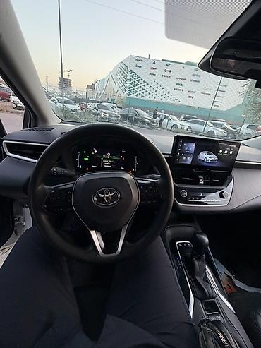 1: Toyota Corolla: 2023 г., 1.8 л, Вариатор, Гибрид, Седан — 5