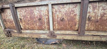 Yük maşınları üçün qoşqular: Bortları açılan kuza. Uzunluğu 4,3 m Eni 2,5 m Tam dəmir kuza — 2