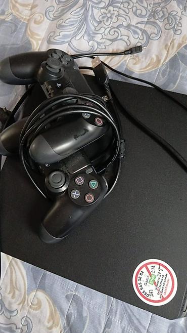 efootbal: PlayStation 4 Slim 1TB oyun konsolu - Model: PS4 Slim (qara rəng) - — 2