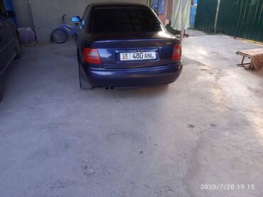 малибу машина цена бишкек: Автомобиль Audi A4 в темно-синем цвете, представленный в кузове седан