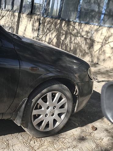 4 108: Nissan Almera Classic: 2004 г., Седан — 1