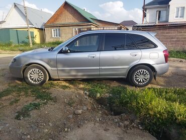 runx alex: Mazda 323: 2002 г., 1.6 л, Механика, Бензин, Хетчбек