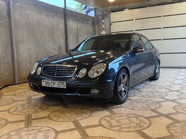 volkswagen touareg ii: Mercedes-Benz E 260: 2.6 л | 2002 г. Седан