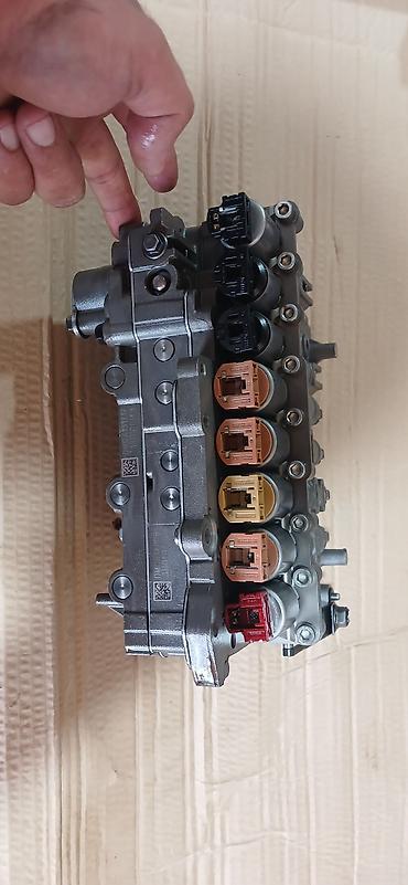 Ötürücü qutuların detalları: AVTOMATİK SÜRƏTLƏR QUTUSU KLAPAN GÖVDƏSİ (VALVE BODY) – tam komplekt — 1