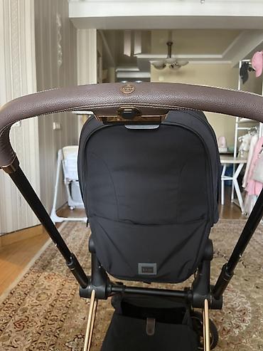ам ням: Прогулочная коляска Cybex (линейка Priam 4— фирменная эмблема и бренд — 5