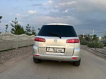 мата секыл: Mazda 2: 2003 г., 1.3 л, Кол менен иштөөчү, Бензин, Хетчбек — 10