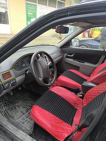 kredit avto aksesuar: Lada Priora Universal – qara rəng, praktik və geniş salonlu ailə — 3