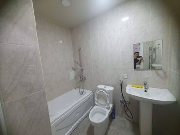 Uzunmüddətli kirayə mənzillər: Yasamal Midada Yeni tikilmiş 9 mərtəbəli binanın 1-ci mərtəbəsində 2 — 8