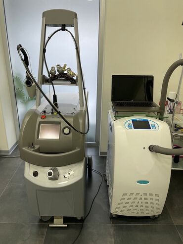 Düzləşdiricilər və ütüfenlər: Lazer epilyasiyası üçün istifadə olunan, boz rəngdə stasionar diod