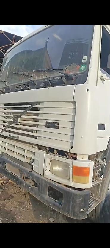 özüboşaldan yük maşınları: Ekskavator və betonqarışdıran yük maşını – tikinti və qazıntı işləri — 4