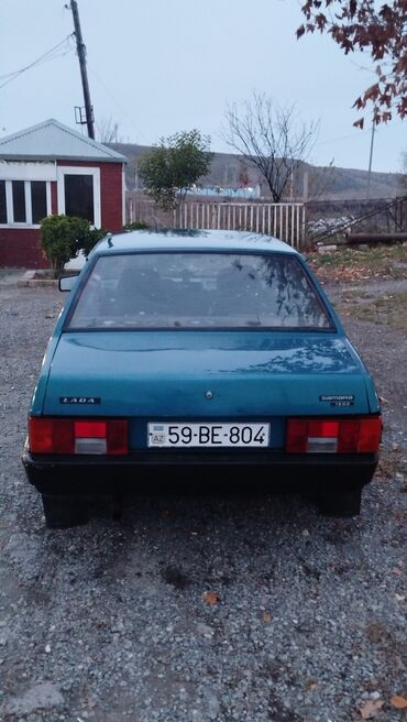 VAZ (LADA): Model: LADA Samara (sedan) Rəng: yaşıl-mavi Dövlət nömrə nişanı — 12