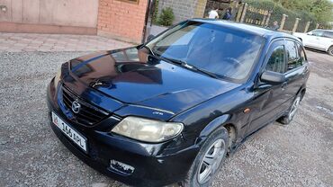 купить верблюжье одеяло: Mazda 323: 2002 г., 1.3 л, Механика, Бензин
