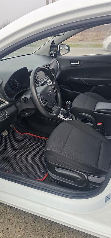 Другие детали салона: Hyundai Solaris — интерьер и оснащение - Салон: тканевая обивка — 9