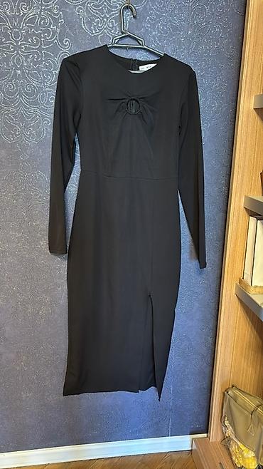 Qara rəngli zərif qadın donu - Model: uzun qollu, dizdən aşağı midi