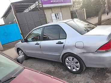 Mitsubishi: Mitsubishi Lancer: 2005 г., 1.3 л, Механика, Бензин, Седан — 3