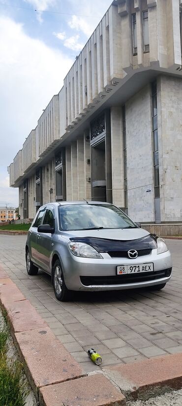 Mazda Demio: 2006 г., 1.3 л, Механика, Бензин, Универсал