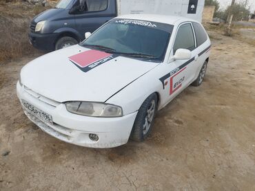 авто тюнинг опель омега: Компактный трехдверный хэтчбек белого цвета с спортивным внешним