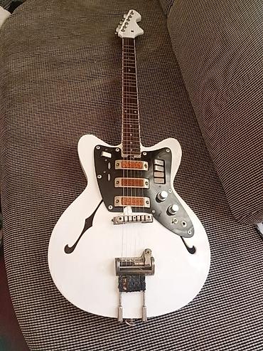 Elektro gitaralar: Elektron gitara, 6 sim, İşlənmiş, Ünvandan götürmə — 3