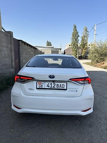 byd e2 2021: Toyota Corolla: 2021 г., 1.8 л, Вариатор, Гибрид, Седан — 3