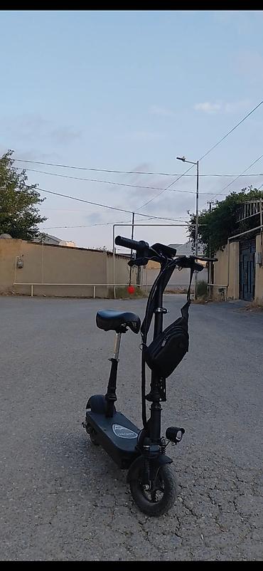 elektrik velosipedi: Elektrik skuter – oturacaqlı, güclü ön amortizatorlu Xüsusiyyətlər: - — 1