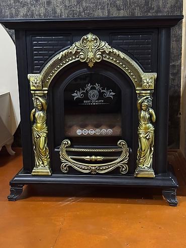 Klassik dizaynlı elektrik kamin - Rəng: qara korpus, qızılı dekor lalafo.az -da Klassik dizaynlı elektrik kamin - Rəng: qara korpus, qızılı dekor