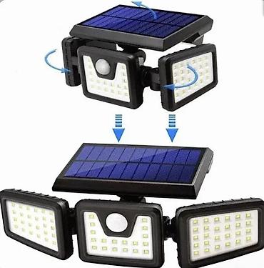 sto: Solarna LED reflektorska lampa sa 3 podesiva panela i senzorom pokreta — 2