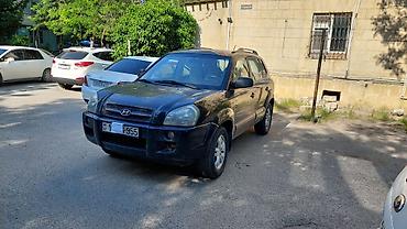 hundai tukson: Hyundai Tucson, qara rəng, 5 qapılı SUV. İli 2006-nın sonu(2007 — 2