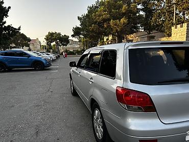 disk: Mitsubishi Airtrek (stansiya/wagon kuzov) – gümüşü rəng Texniki — 3