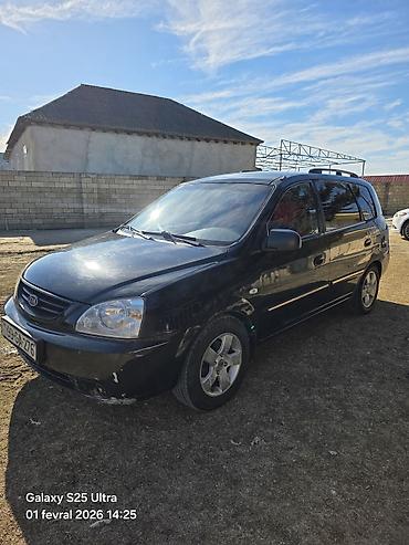 kia r17: Kia Carens, qara rəng, 5 qapılı MPV/miniven. - dizel mühərriki, ön — 4