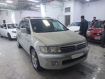 mitsubishi lancer evolution: Mitsubishi Chariot Grandis – 7 yerlik geniş ailə miniveni — 1