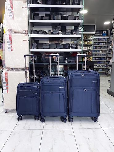 samsonite: Məhsul: 3-lü tekstil çamadan dəsti – təkərli, teleskopik tutacaqlı — 1