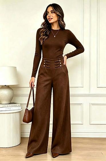 sljokicaste trenerke: Pantalone
Cena 2700
Uni vel.
V20 — 2