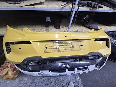 Задний бампер для Kia (оригинальный). - Цвет: жёлтый с чёрными