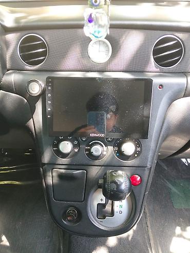 pro scooter: Mitsubishi (Airtrek/Outlander ilk nəsil) krossover, ağ rəng. Xarici — 9